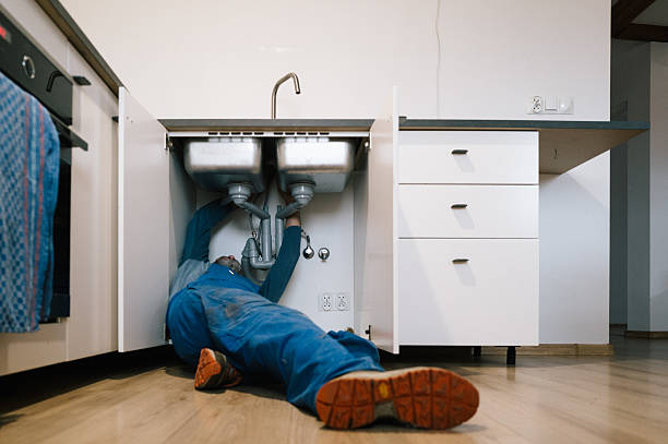 Professional Emergency Plumber technician working in Redkey, IN